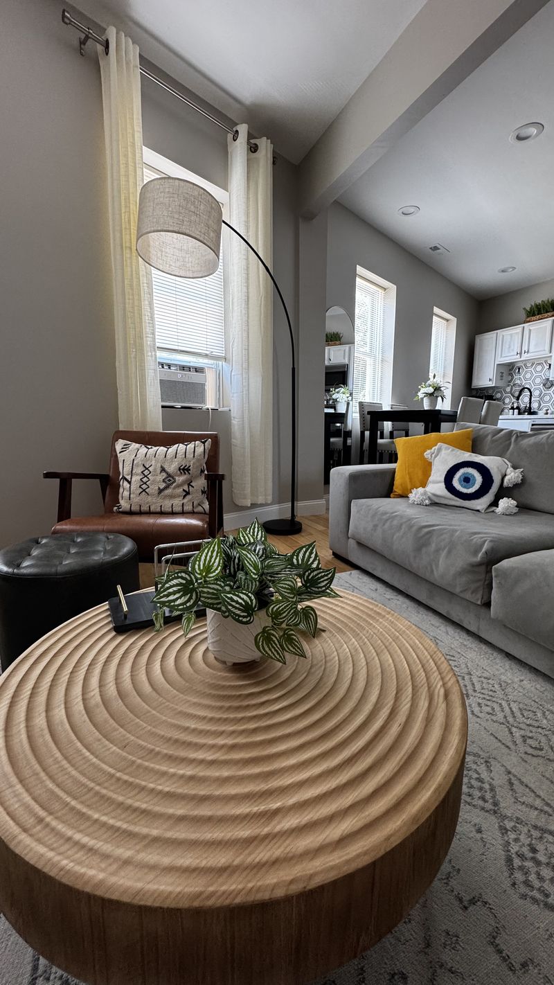 A living room dusted, vacuumed, and reset